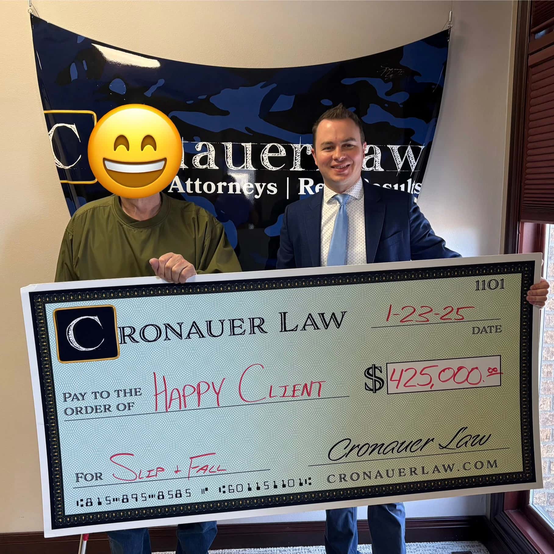 Cronauer Law client receiving settlement check