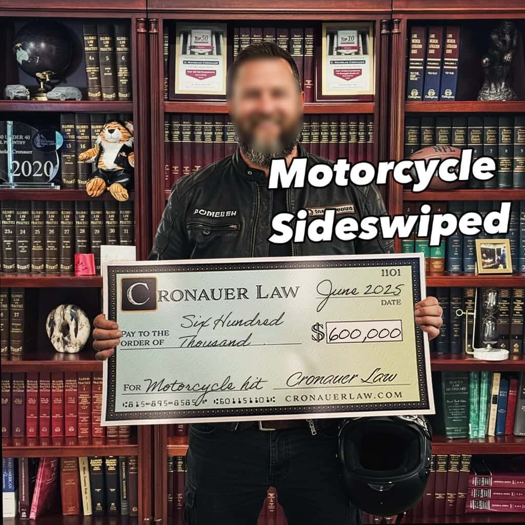 Cronauer Law client receiving settlement check